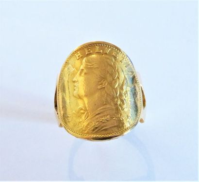 BAGUE formée d'une pièce incurvée de 20 francs...