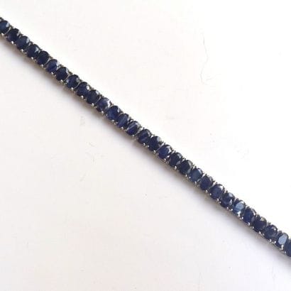 BRACELET articulé en argent (925/°°), orné...