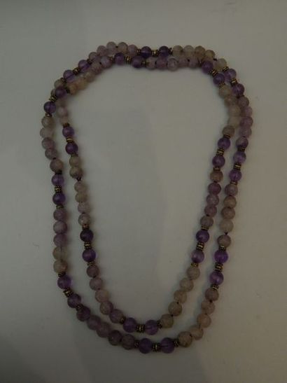 Collier en cristal de roche et améthyste....