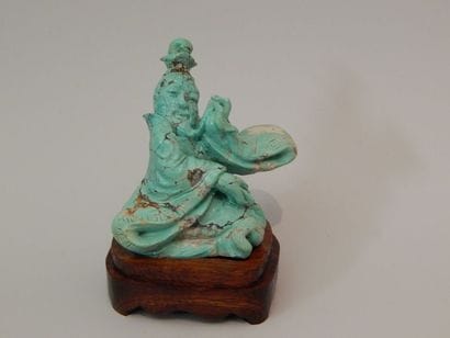 Sculpture en turquoise représentant un moine...