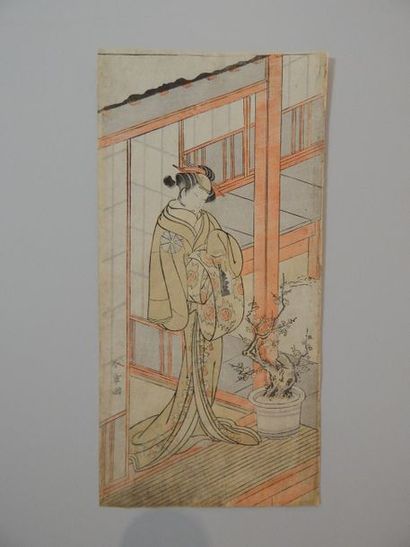 Shunshô. Femme tenant un couteau.