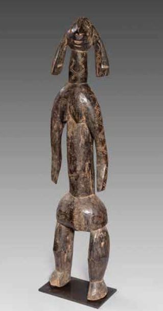 88 quat. Statue Mumuye, Nigeria
Bois dur...