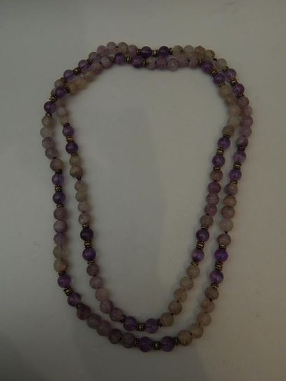 Collier en cristal de roche et améthyste....
