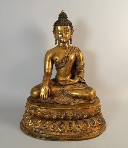 Statuette de Bouddha en bronze doré assis...
