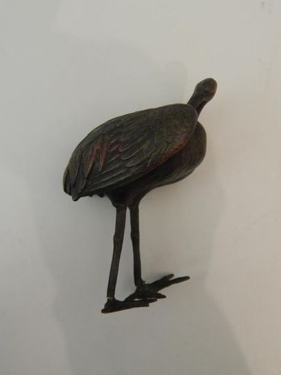 Sujet en forme de héron. En bronze. Japon....