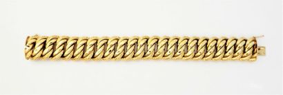 BRACELET maille américaine en or 18K (750/°°),...