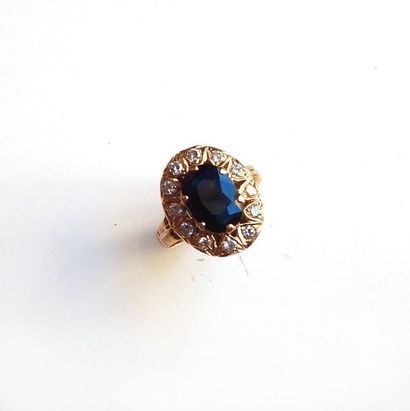 BAGUE en or jaune 18K (750/°°) et argent...