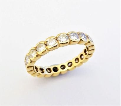 IMPOSANTE ALLIANCE en or jaune 18K (750/°°)...