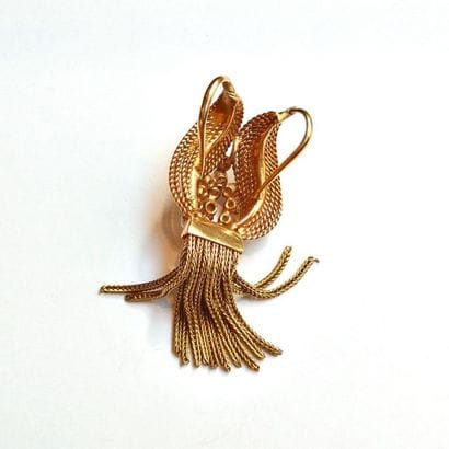 COLLIER en or jaune 18K (750/°°) et son PENDENTIF...
