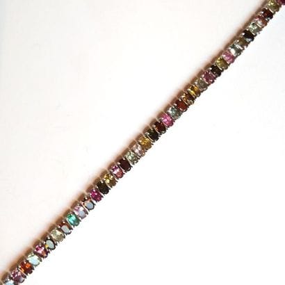 BRACELET articulé en argent (925/°°), orné...