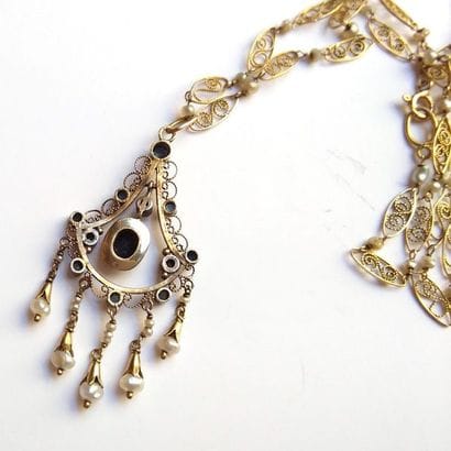 COLLIER en or jaune 18K (750/°°) à maillons...