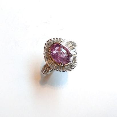 BAGUE en or gris 18K (750/°°) centrée d'un...