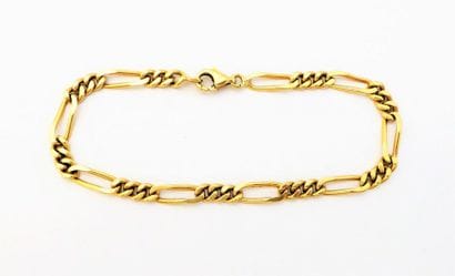 BRACELET en or 18K (750/°°), maille alternée...