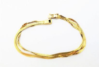BRACELET en or 18K (750/°°), multi-rangs...