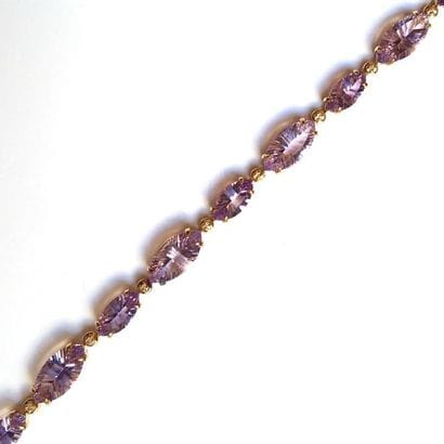 BRACELET articulé en argent doré (vermeil)...
