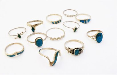 LOT DE 12 BAGUES en argent 835/°° orné de...