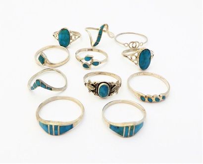 LOT DE 11 BAGUES en argent 835/°° orné de...