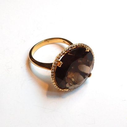 BAGUE en argent doré (vermeil) 925/°° centrée...