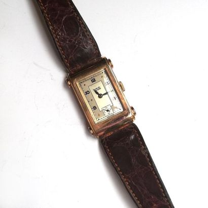 300 BIS. UNIC. Montre en or jaune 18K (750°/°°,...