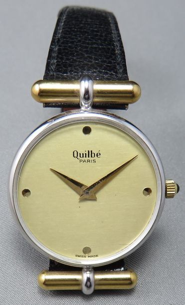 QUILBE, PARIS. MONTRE BRACELET en métal bicolore...