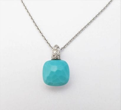 POMELATTO. COLLIER en or blanc 18 K (750/°°)...