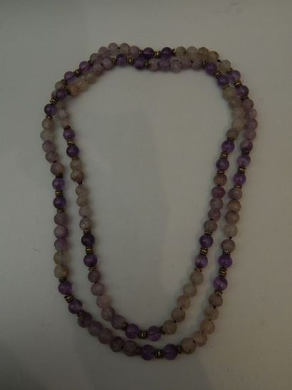 Collier en cristal de roche et améthyste....