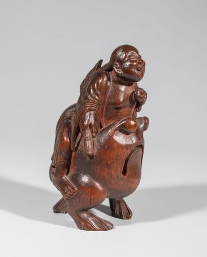 Figure en bambou, sculptée d’un enfant sur...