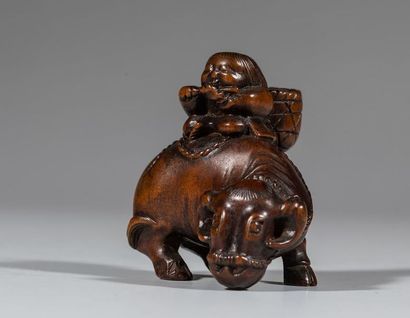 Netsuke en buis, représentant un enfant sur...