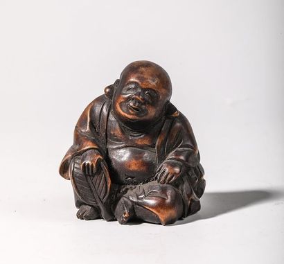 Netsuke en buis, représentant un bouddha...
