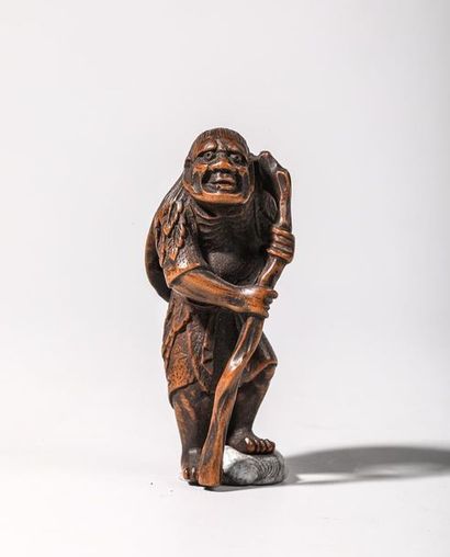 Netsuke en buis, représentant un vieillard...