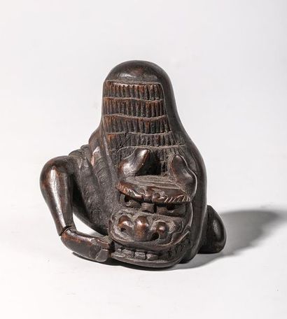 Netsuke en buis, représentant un acteur portant...