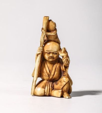 Netsuke en ivoire, représentant un enfant...