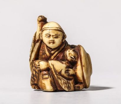 Netsuke en ivoire, représentant un vieillard...