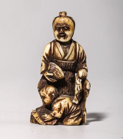 Netsuke en ivoire, représentant un pêcheur...