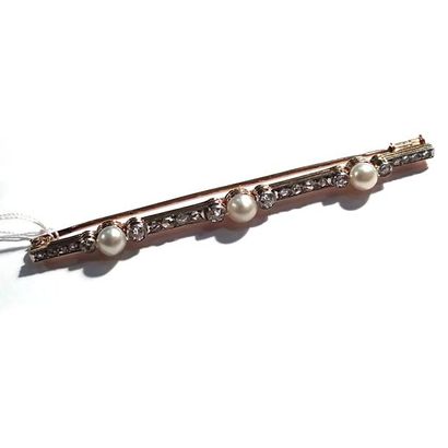 BROCHE BARRETTE en or jaune 18k (750/°°)...