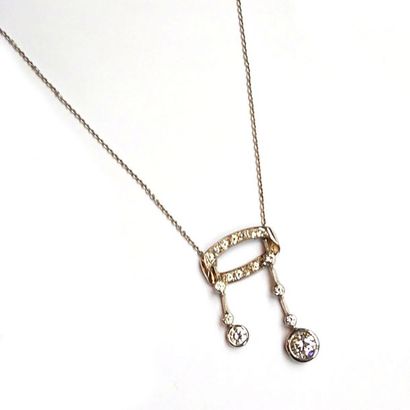 COLLIER négligé en or gris 18k (750/°°) centré...