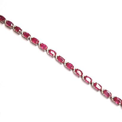 BRACELET articulé en argent (925°/°°) serti...