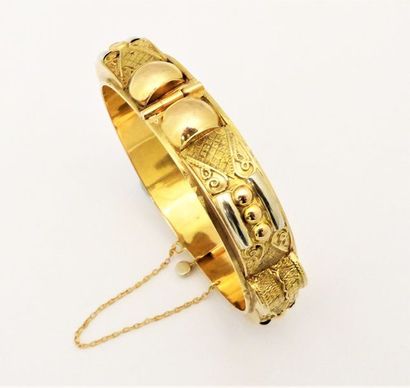 JONC en or 18k (750/°°), ouvragé d'or rose...