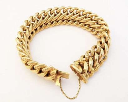 BRACELET en or 18k (750/°°) gourmette maille...