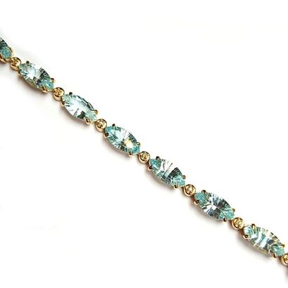 BRACELET en argent doré (vermeil) 925/°°...