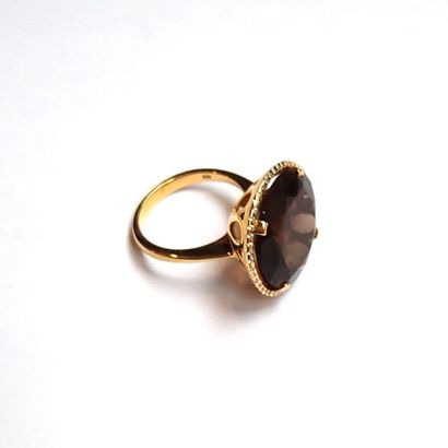 BAGUE en argent doré (vermeil) 925/°° centrée...