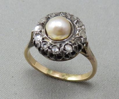 BAGUE en or 18k (750°/00) et argent, ornée...