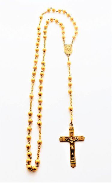 CHAPELET en or jaune 18k (750/°°) orné de...
