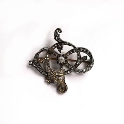BROCHE ancienne en or jaune 18K (750/°°)...