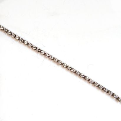 BRACELET RIVIERE en or blanc 18K (750°/°°)...