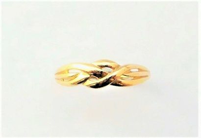 BAGUE en or 18K (750/°°), fils tressés. TDD...