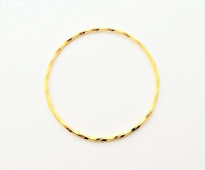BRACELET JONC torsadé en or 18K (750/°°),...