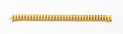 BRACELET en or 18K(750/°°) maille américaine,...