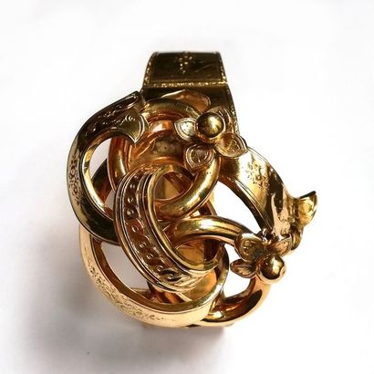 BRACELET en or jaune 18K (750/°°) articulé...