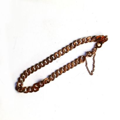 BRACELET GOURMETTE en or jaune 18K (750°/°°)....